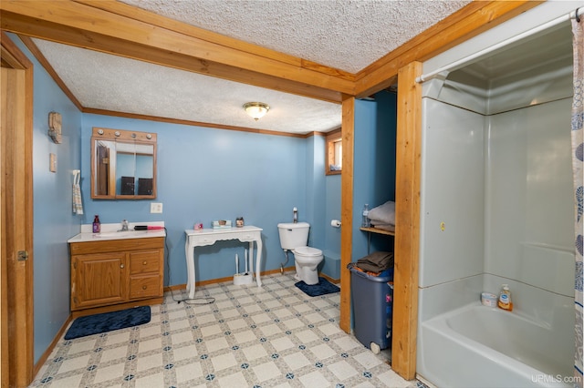 full bathroom with toilet, shower / washtub combination, a textured ceiling, ornamental molding, and vanity