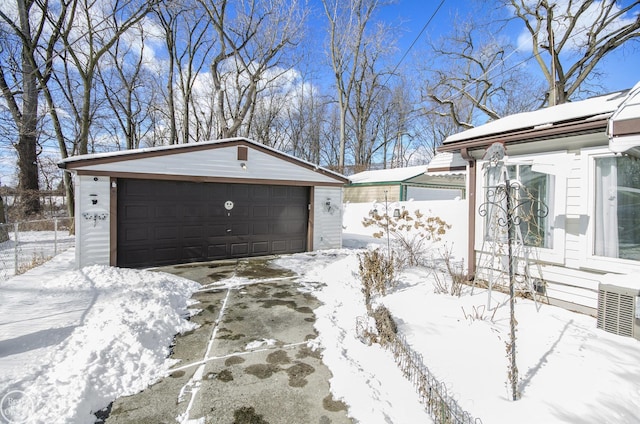 view of snow covered garage