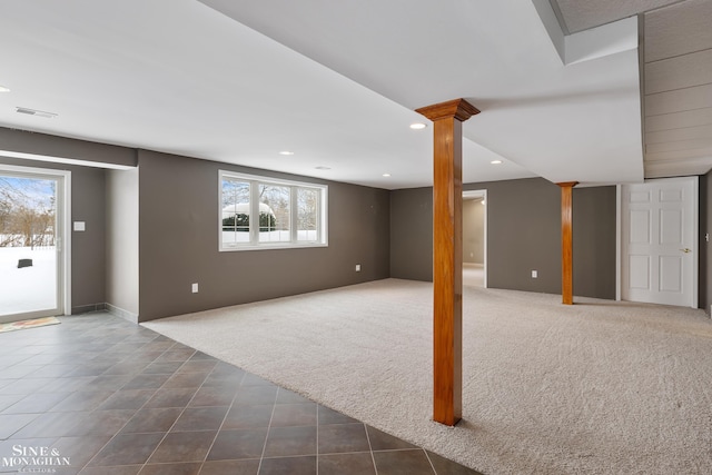 basement with dark carpet