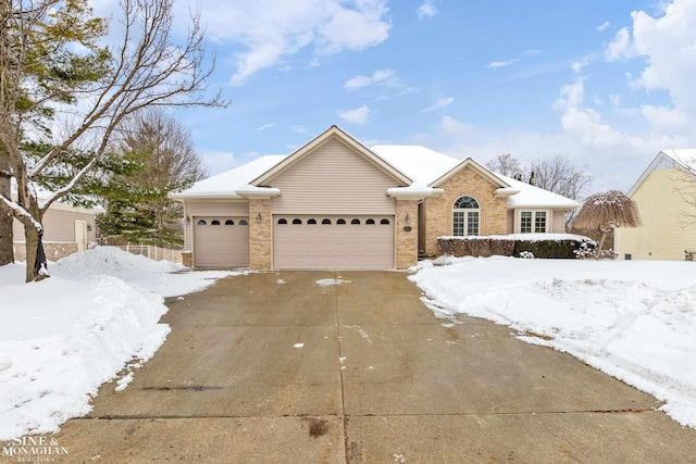 ranch-style home with a garage