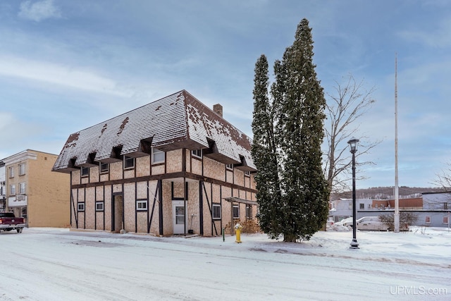 view of snow covered property