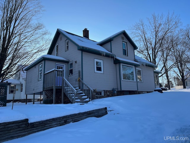 view of snow covered property