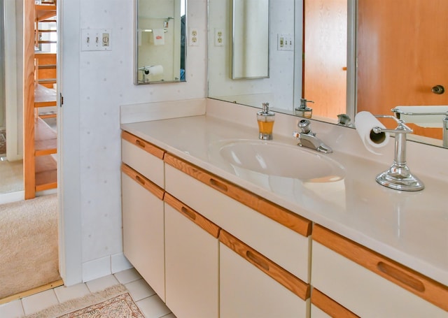 bathroom with vanity and tile patterned floors