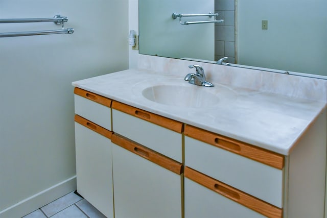 bathroom featuring tile patterned floors and vanity