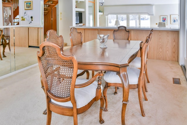 view of carpeted dining space