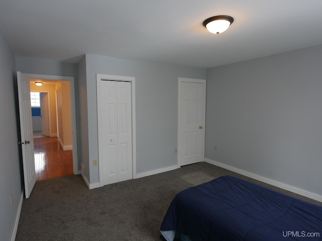 carpeted bedroom featuring a closet