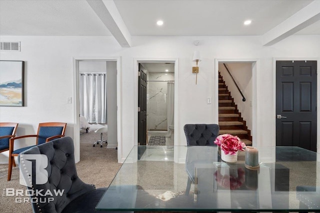 carpeted dining space with recessed lighting, visible vents, beamed ceiling, and stairs