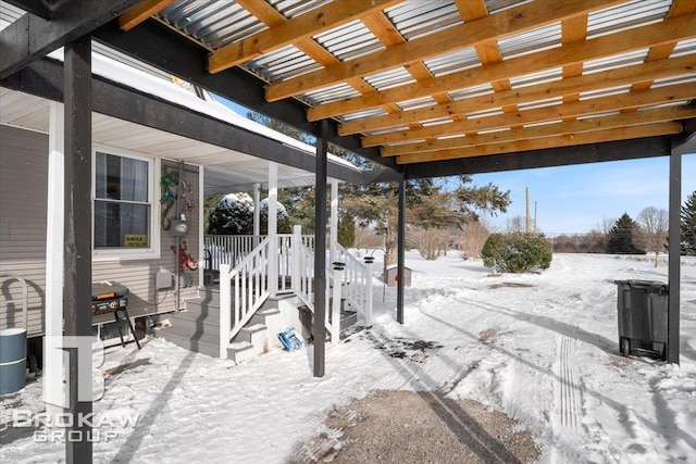 view of snow covered patio