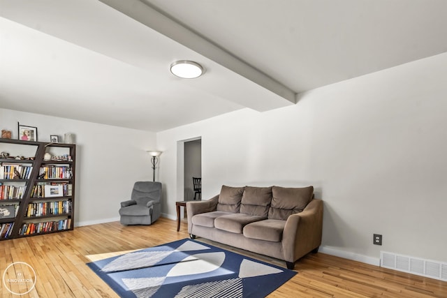 living room with wood-type flooring