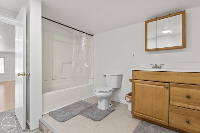 full bathroom featuring toilet, shower / bath combo, and vanity