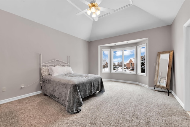 carpeted bedroom featuring lofted ceiling and ceiling fan