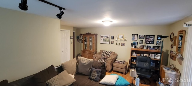 living room featuring rail lighting