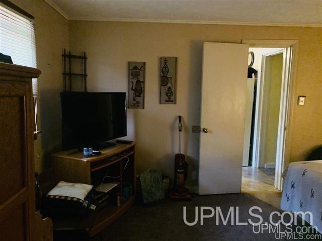 interior space featuring crown molding