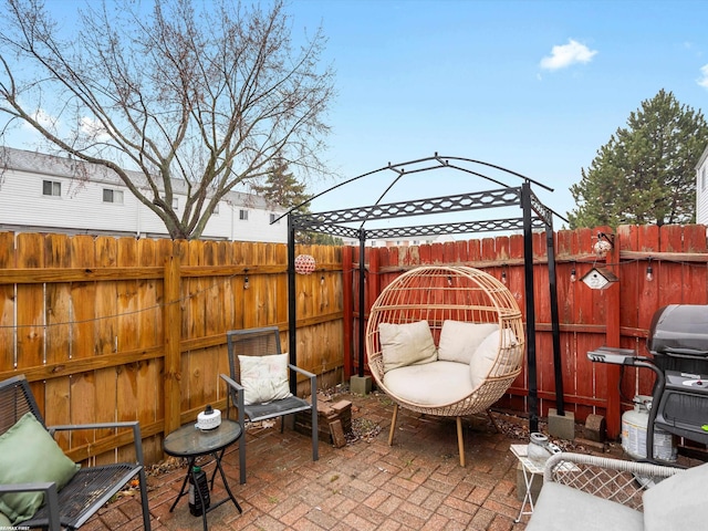 view of patio / terrace with a grill and a fenced backyard