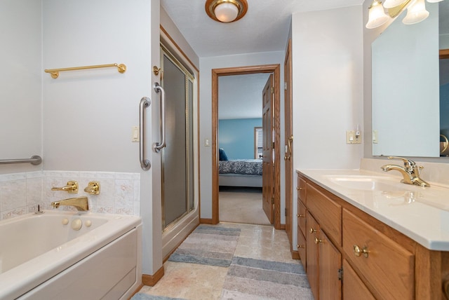 ensuite bathroom featuring baseboards, a garden tub, vanity, a shower with door, and ensuite bathroom