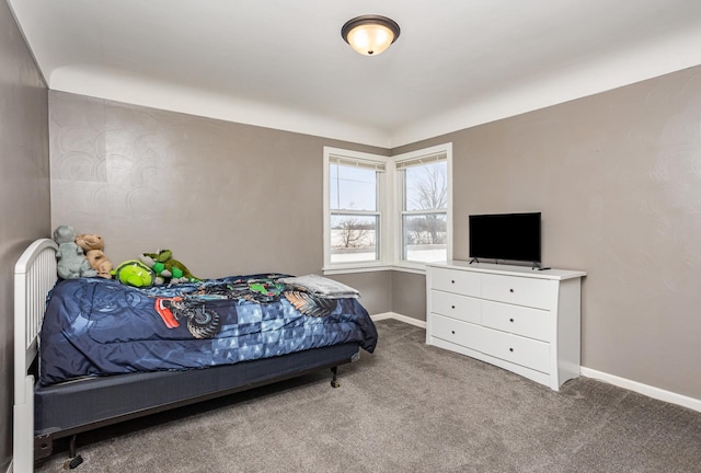 carpeted bedroom with baseboards