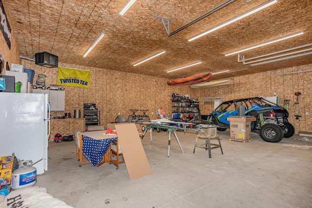 garage featuring freestanding refrigerator