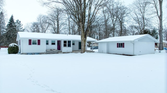 single story home featuring entry steps and a garage