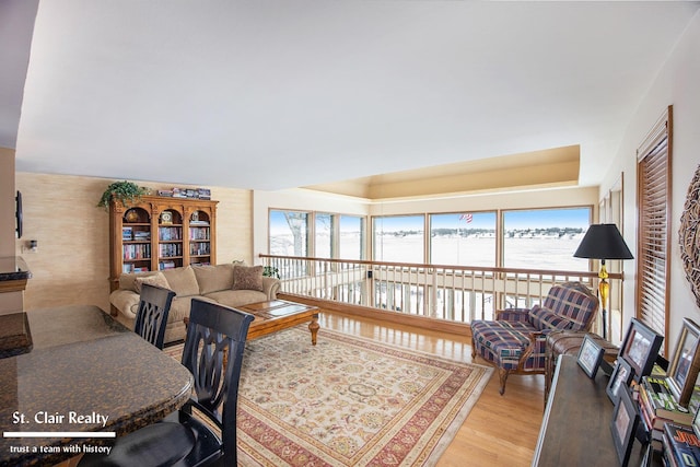 living room with light wood finished floors and a wealth of natural light