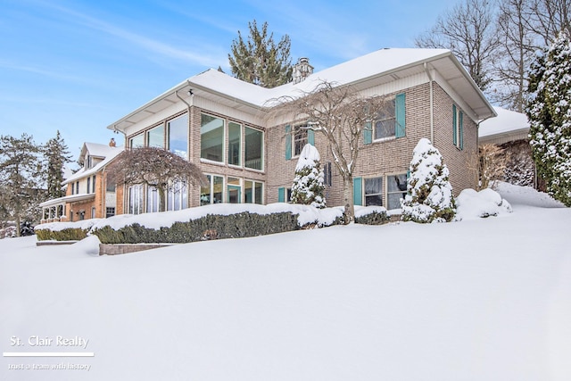 view of front of home with a chimney