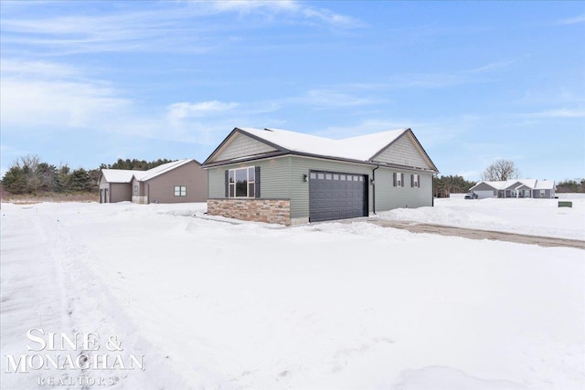 ranch-style home featuring an attached garage