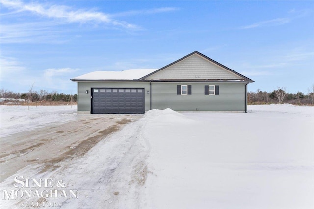 view of front of home featuring a garage