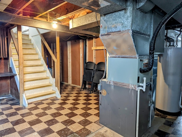 unfinished below grade area featuring gas water heater, stairway, heating unit, and tile patterned floors