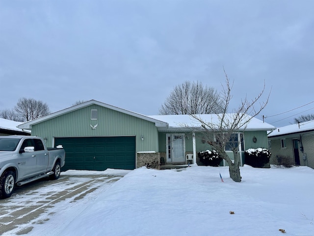 ranch-style house featuring an attached garage