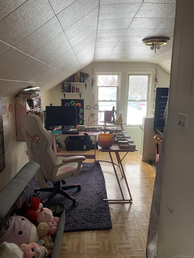 office space featuring vaulted ceiling