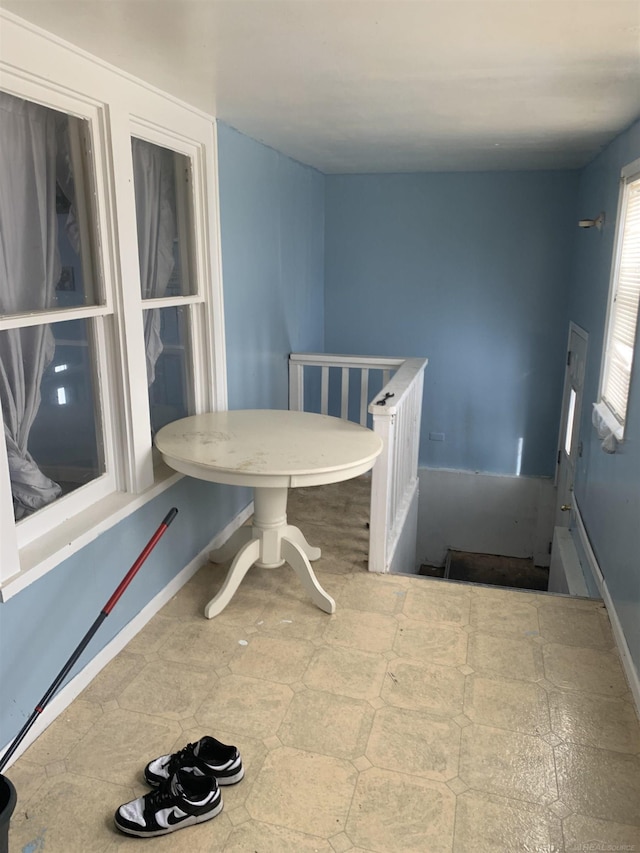 dining room featuring baseboards