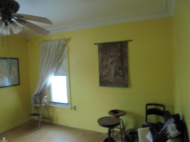 3606 Cadieux Rd, Detroit, MI 48224 - misc room with light wood-type flooring, baseboards, a ceiling fan, and crown molding