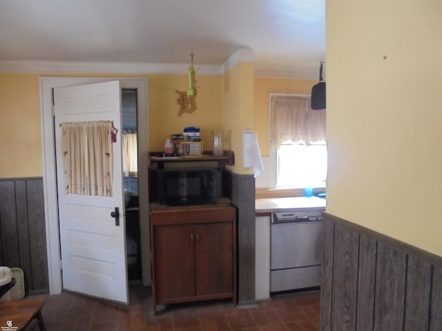 3606 Cadieux Rd, Detroit, MI 48224 - kitchen with black microwave, dishwashing machine, a wainscoted wall, and wooden walls