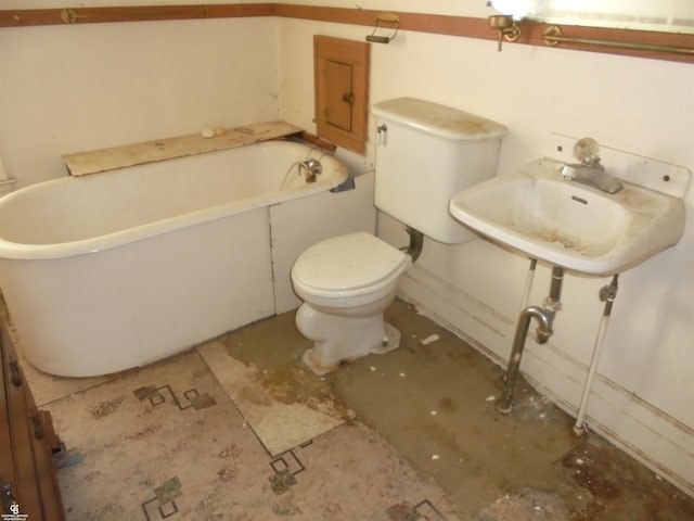 3606 Cadieux Rd, Detroit, MI 48224 - bathroom with a bathtub, a sink, and toilet