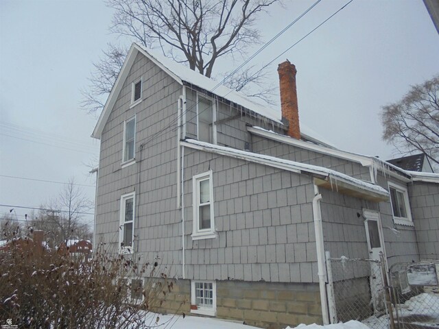 3606 Cadieux Rd, Detroit, MI 48224 - view of property exterior featuring a chimney