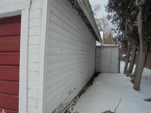 3606 Cadieux Rd, Detroit, MI 48224 - view of property exterior featuring a garage and brick siding