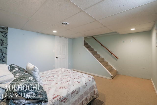 bedroom featuring a paneled ceiling, visible vents, and recessed lighting