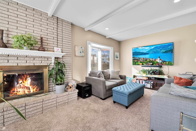 living area featuring recessed lighting, beam ceiling, light colored carpet, and a fireplace