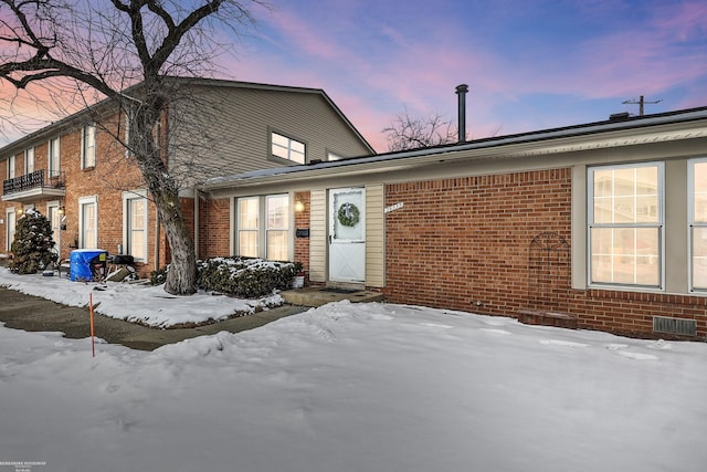 view of front facade with brick siding