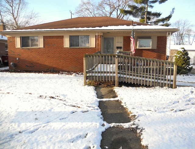 view of front of home featuring brick siding