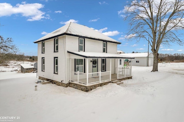 view of front of property featuring covered porch