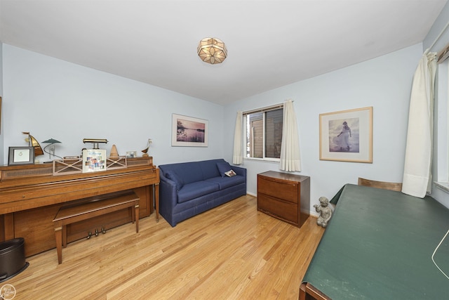 home office with wood finished floors