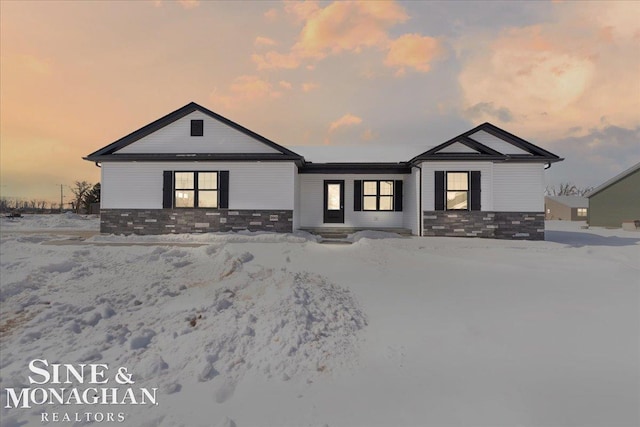 view of front of property featuring stone siding