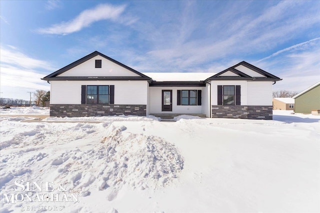 view of front of house featuring stone siding