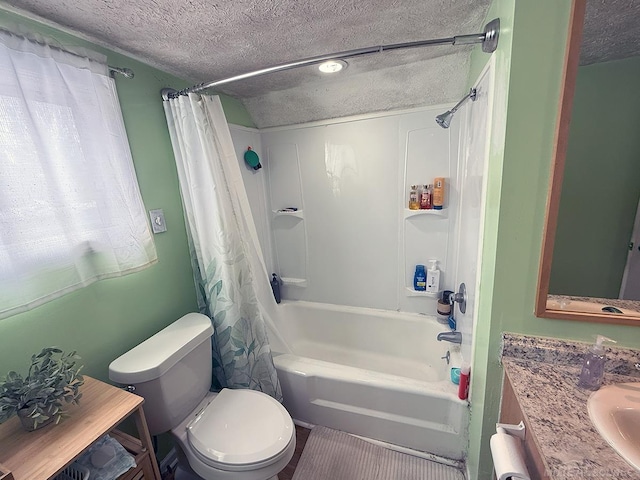 full bath with toilet, shower / tub combo, a textured ceiling, and vanity