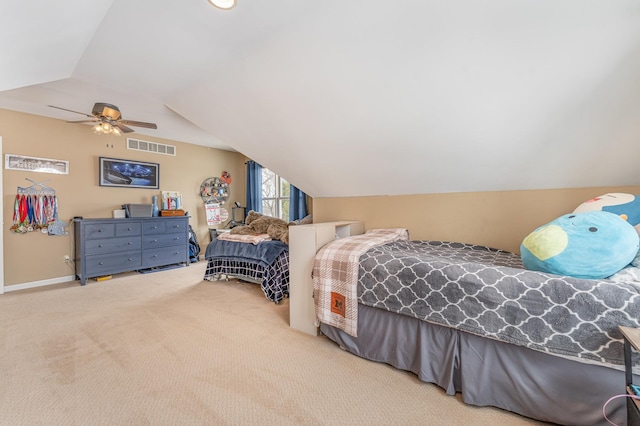 bedroom featuring visible vents, light carpet, vaulted ceiling, ceiling fan, and baseboards