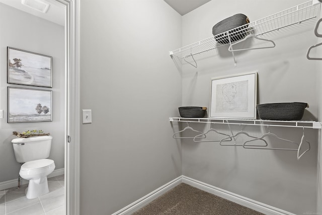 walk in closet with tile patterned flooring and visible vents