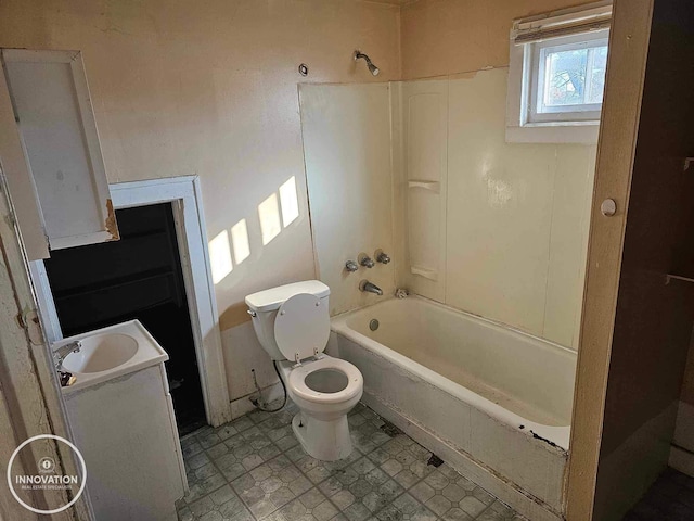 full bathroom with washtub / shower combination, vanity, and toilet