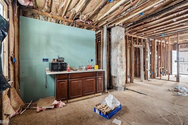 miscellaneous room with a sink