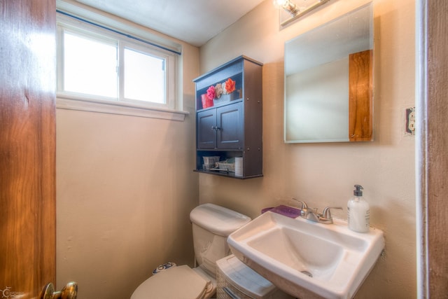 bathroom featuring a sink and toilet