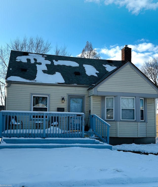 view of front of property featuring a chimney